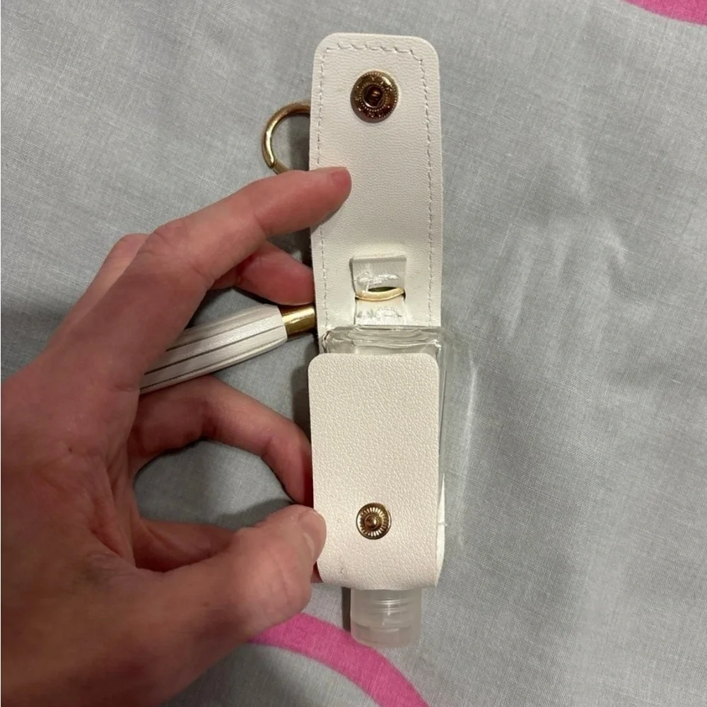 White Hand Sanitizer Keychain with Tassel and Gold Hardware